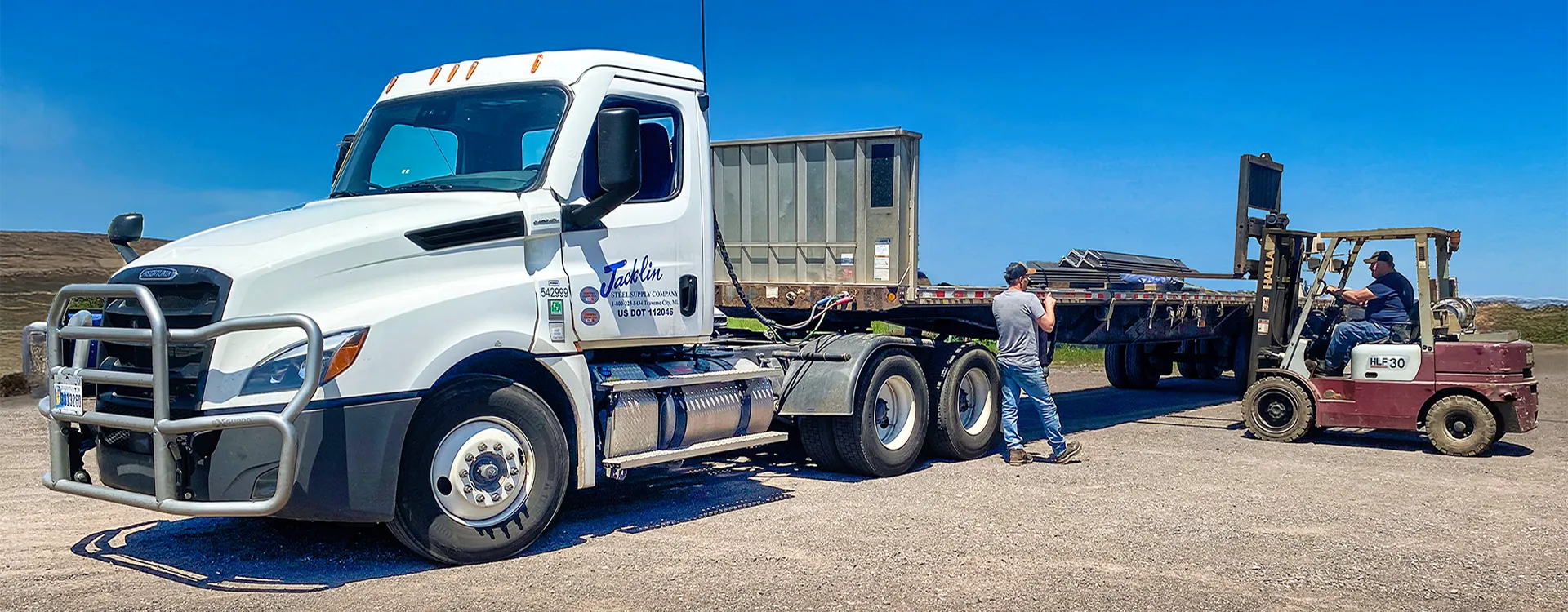 unloading truckload of steel